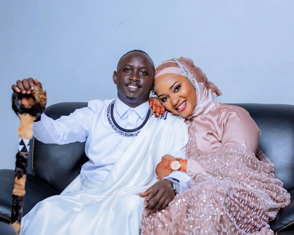 Traditional Rwandan couple portrait - cultural photography studio Kigali