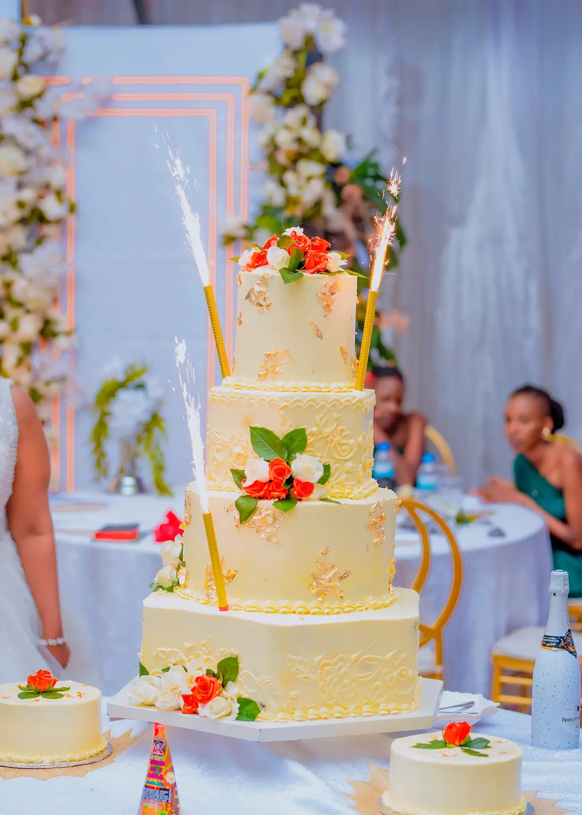 Luxurious wedding cake with sparklers at reception - event photography Kigali